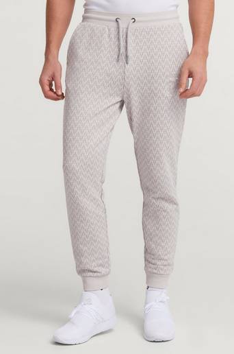 SIKSILK Mjukisbyxor Messi x SikSilk Monogram Print Cuffed Pant Grå