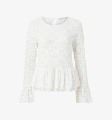 Hvid langærmet bluse i struktureret stof med udsvunget kant.