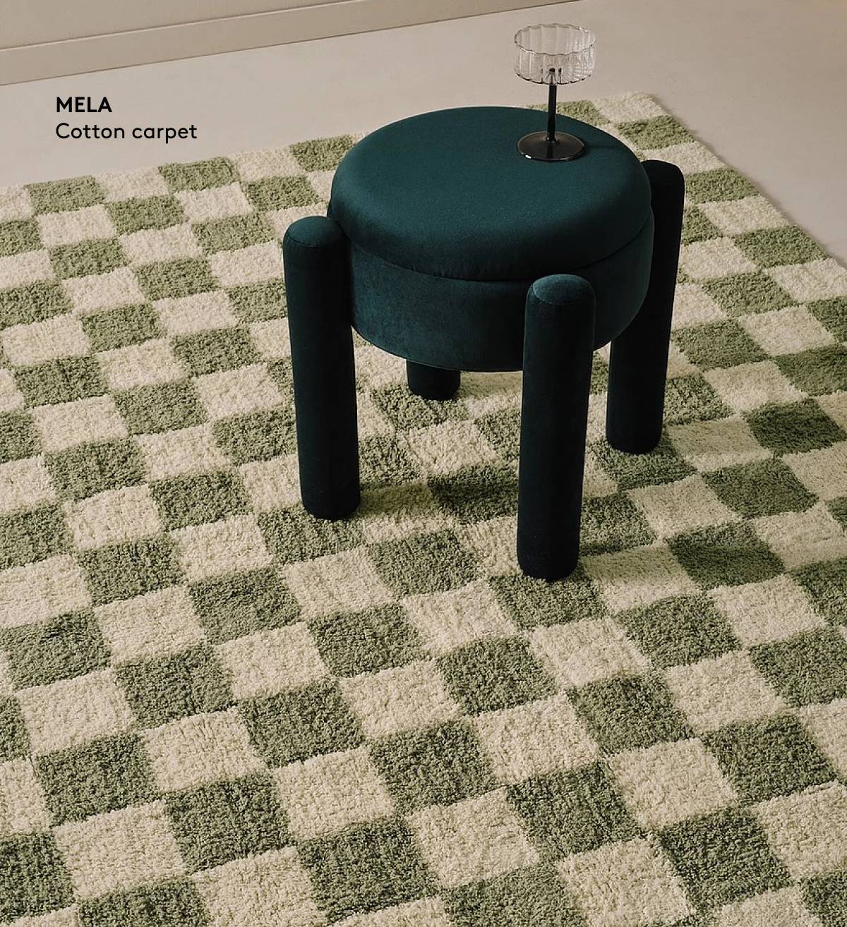 Vihreän ja valkoisen ruudullinen puuvillamatto